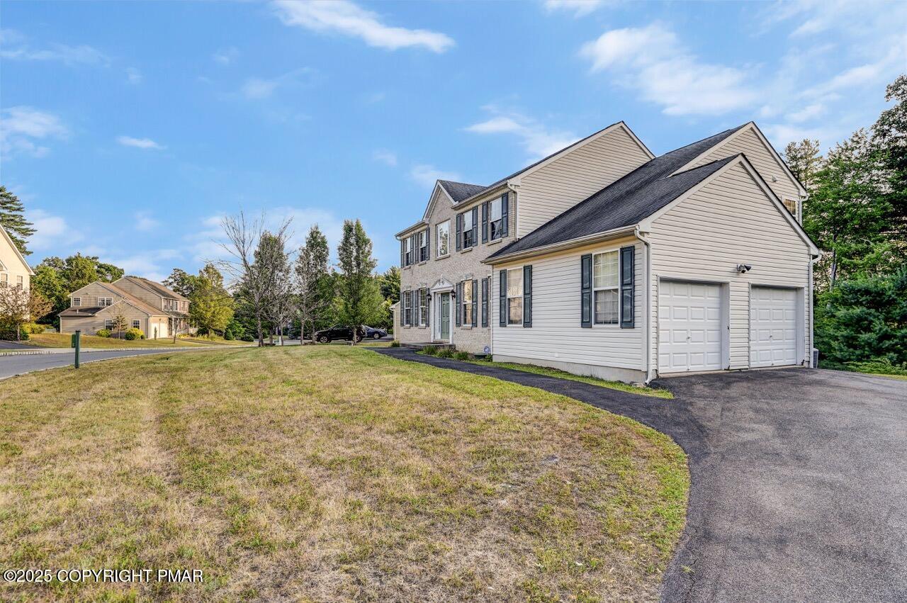 115 Daffodil Drive East Stroudsburg, PA 18301 - Photo 58 of 59 a view of a house with a yard
