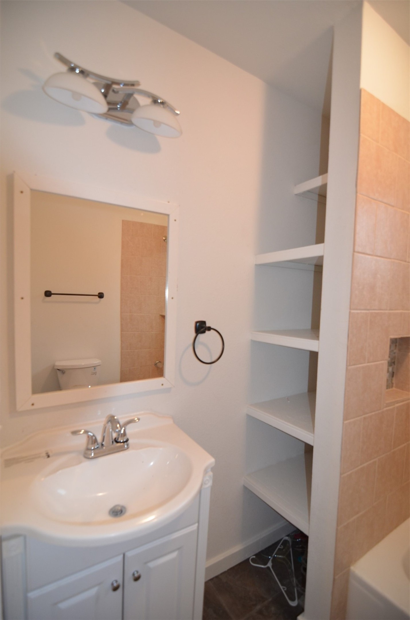 2123 Marion Street, Unit 1 Houston, TX 77009 - Photo 16 of 19 a bathroom with a sink and a mirror