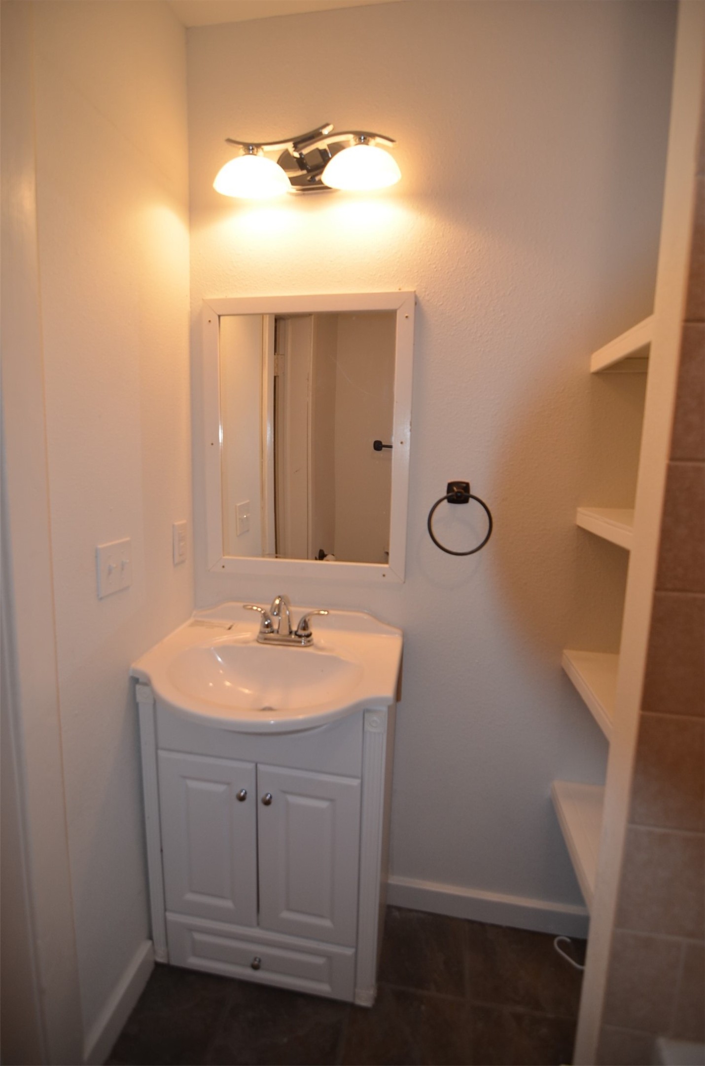 2123 Marion Street, Unit 1 Houston, TX 77009 - Photo 18 of 19 a bathroom with a sink a toilet and mirror