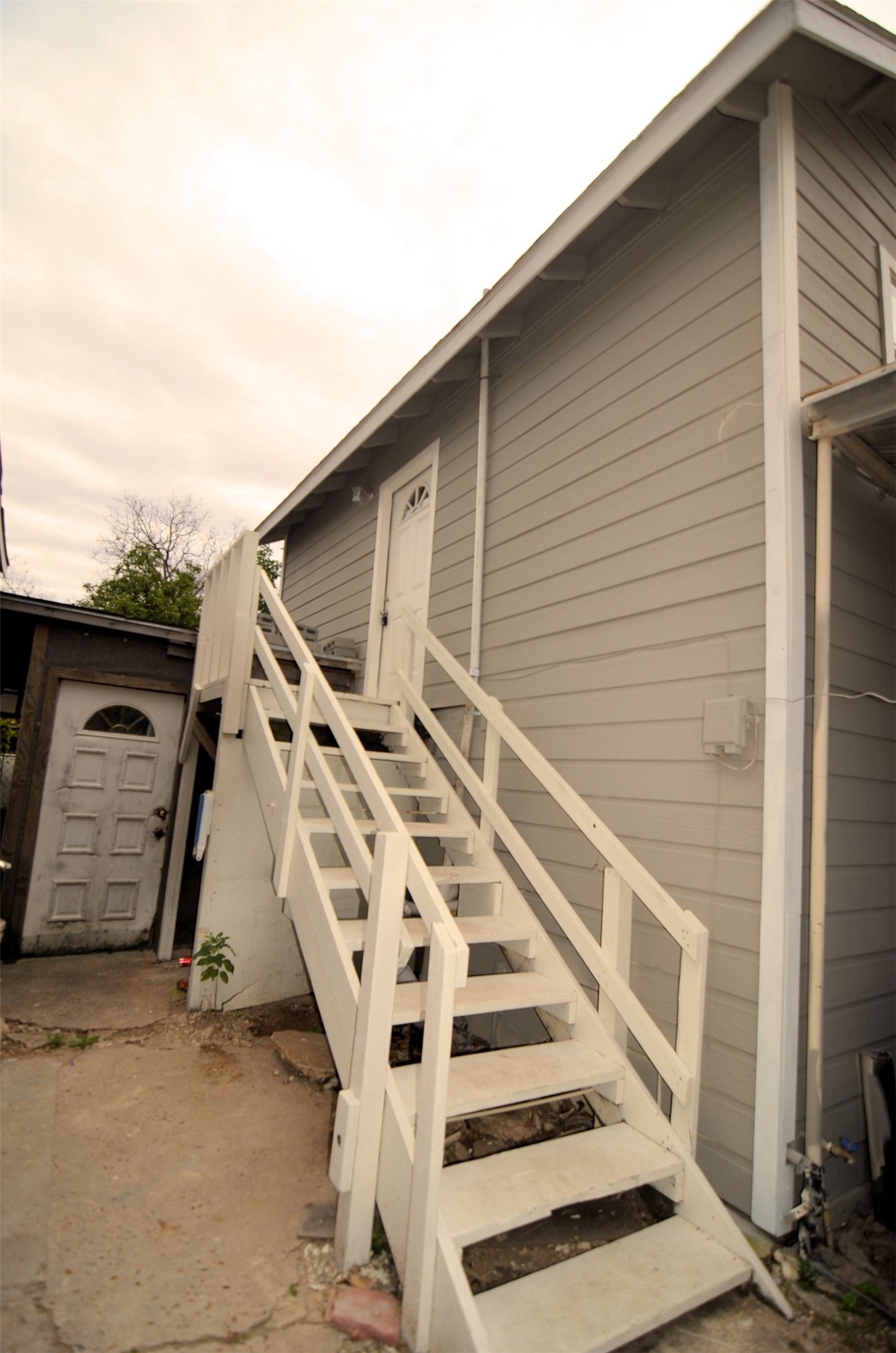 2123 Marion Street, Unit 1 Houston, TX 77009 - Photo 19 of 19 a view of a house with wooden stairs