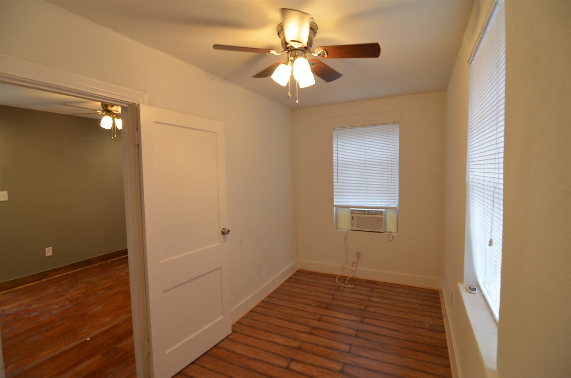 2123 Marion Street, Unit 1 Houston, TX 77009 - Photo 10 of 19 a view of an empty room and wooden floor