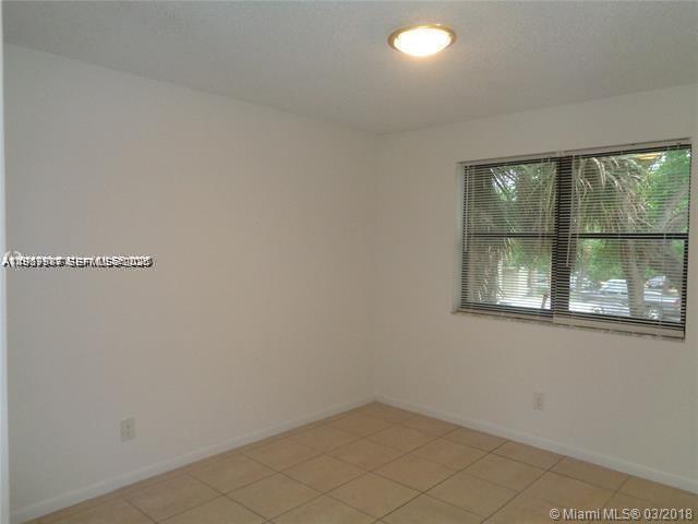 650 South Park Road, Unit 215 Hollywood, FL 33021 - Photo 13 of 24 an empty room with a window