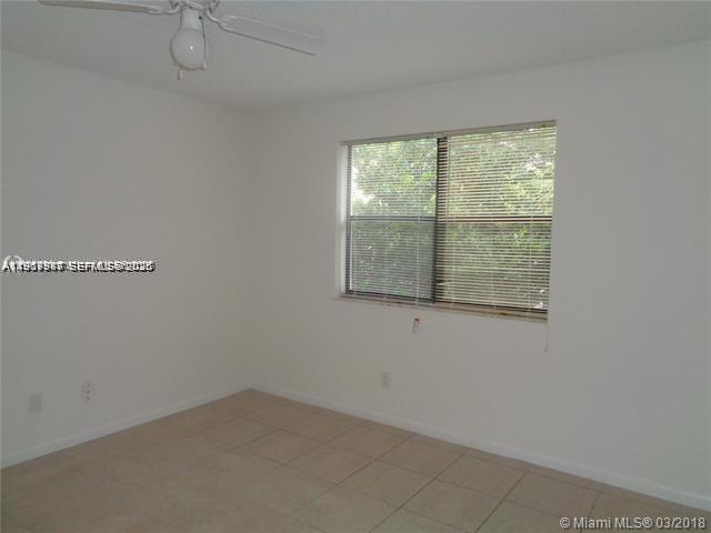 650 South Park Road, Unit 215 Hollywood, FL 33021 - Photo 14 of 24 an empty room with a window