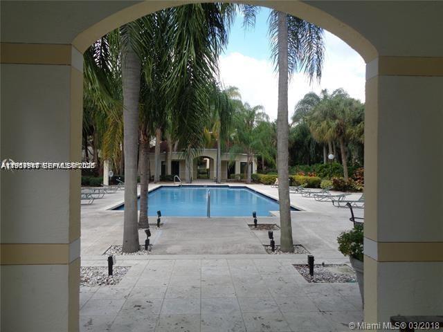 650 South Park Road, Unit 215 Hollywood, FL 33021 - Photo 17 of 24 a view of swimming pool with a patio