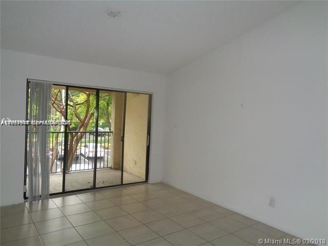 650 South Park Road, Unit 215 Hollywood, FL 33021 - Photo 5 of 24 an empty room with windows