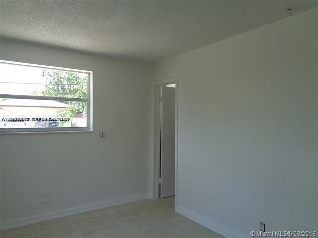 650 South Park Road, Unit 215 Hollywood, FL 33021 - Photo 9 of 24 an empty room with a window