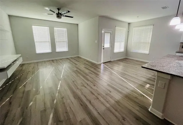 a kitchen with sink and window