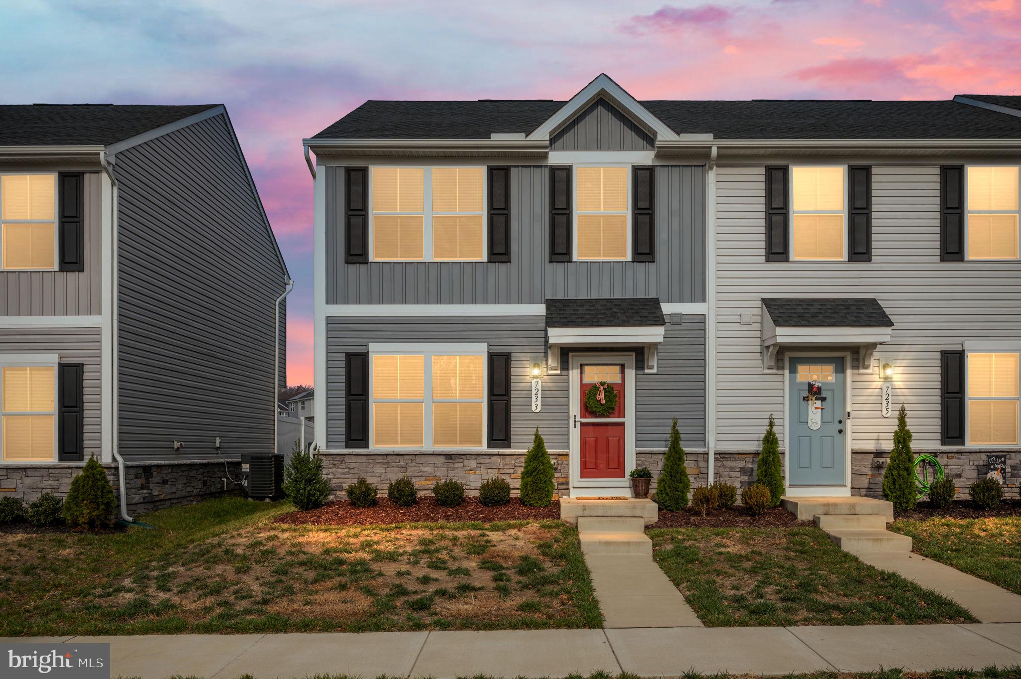 7233 Statesman Boulevard Ruther Glen, VA 22546 - Photo 1 of 31 a front view of a house with yard