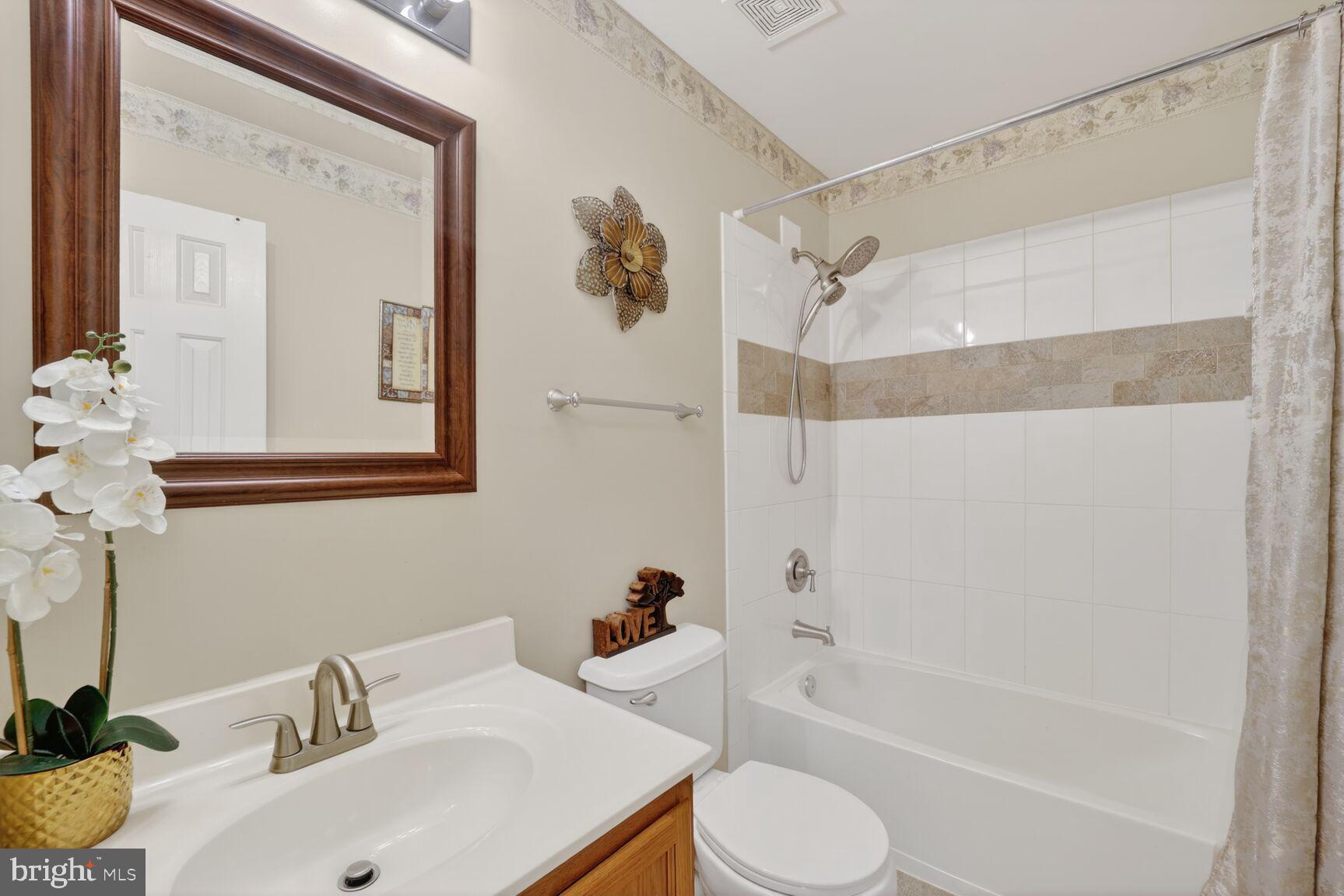 165 Tilden Way Edgewater, MD 21037 - Photo 16 of 22 a bathroom with a sink toilet and shower