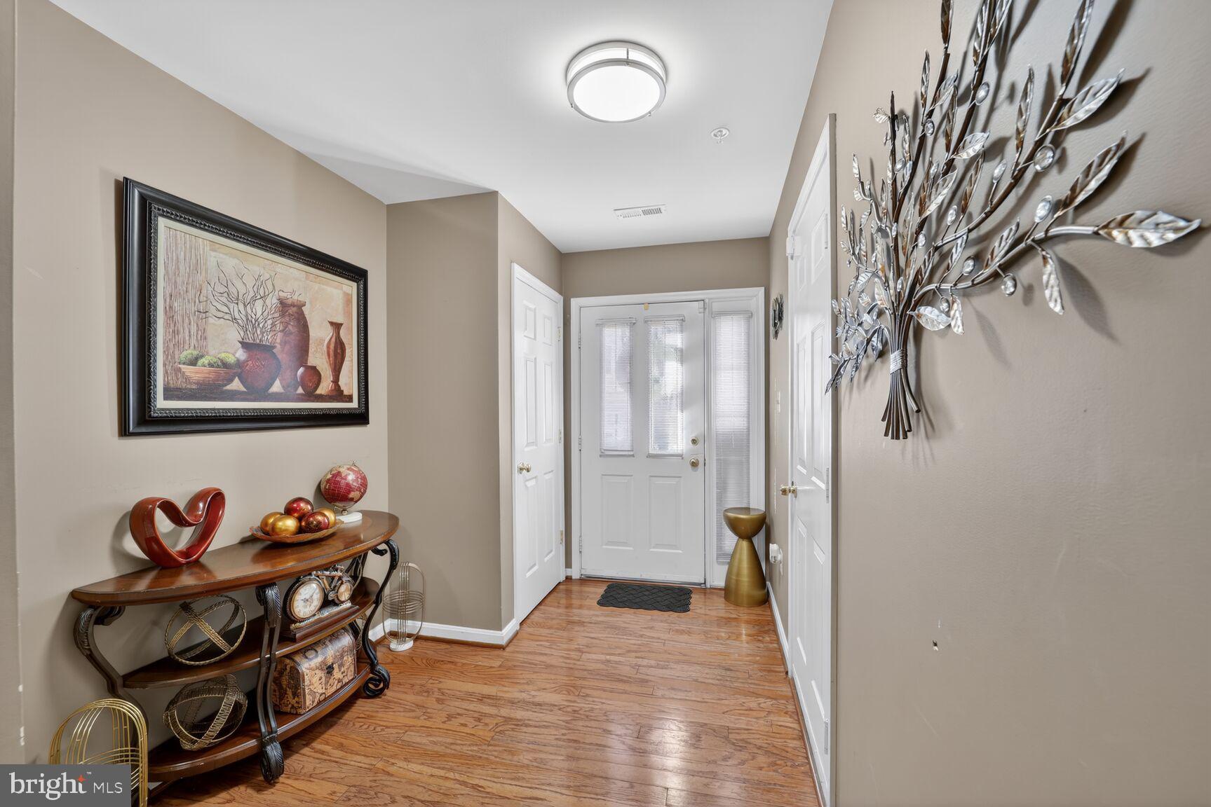 165 Tilden Way Edgewater, MD 21037 - Photo 2 of 22 a view of a hallway with workspace and a window