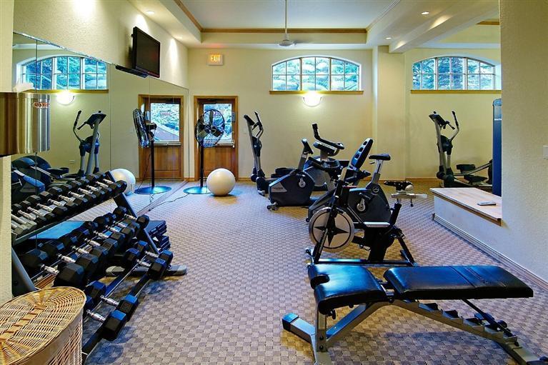 210 Offerson Road, Unit R212 / WEEK 28 Beaver Creek, CO 81620 - Photo 14 of 20 a room with lots of chairs and mirrors