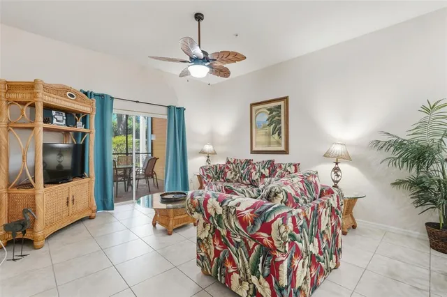 a bedroom with a bed and dresser with mirror