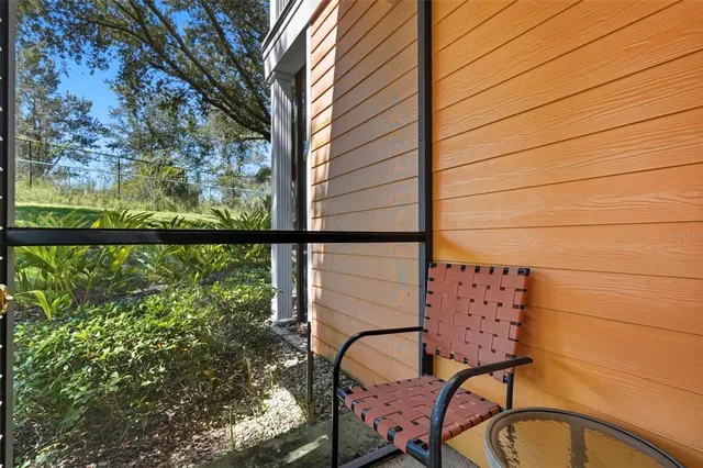 an aerial view of residential house with outdoor space and swimming pool