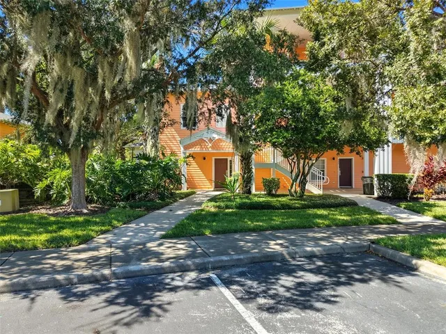 a view of a road with a building in the background