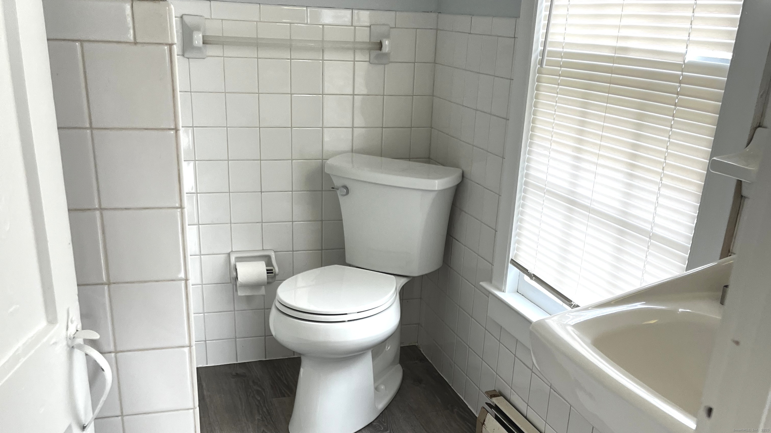 562 Amity Road, Unit D Bethany, CT 06524 - Photo 23 of 40 a bathroom with a toilet and a shower