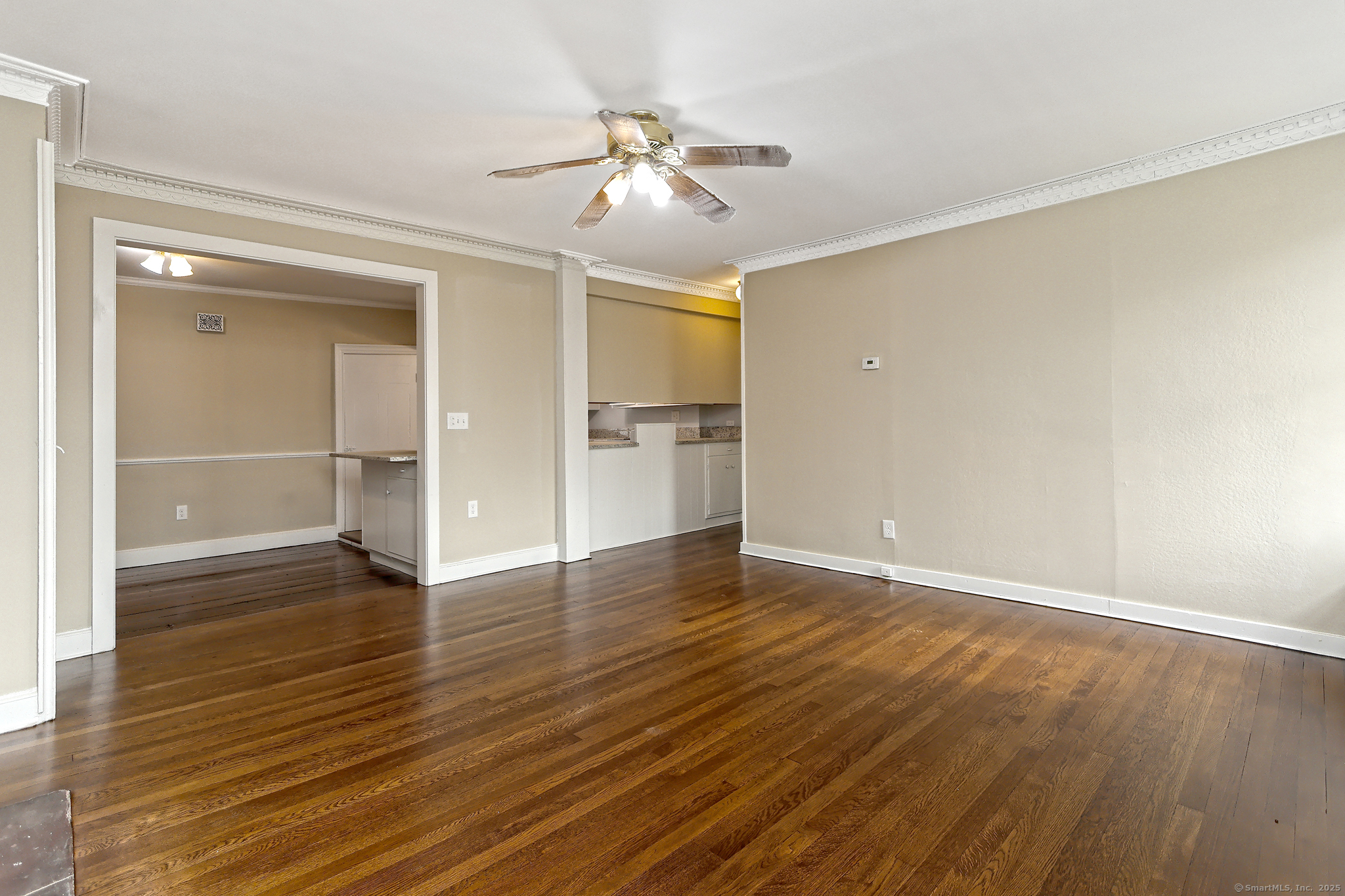 562 Amity Road, Unit D Bethany, CT 06524 - Photo 32 of 40 wooden floor in an empty room with a window