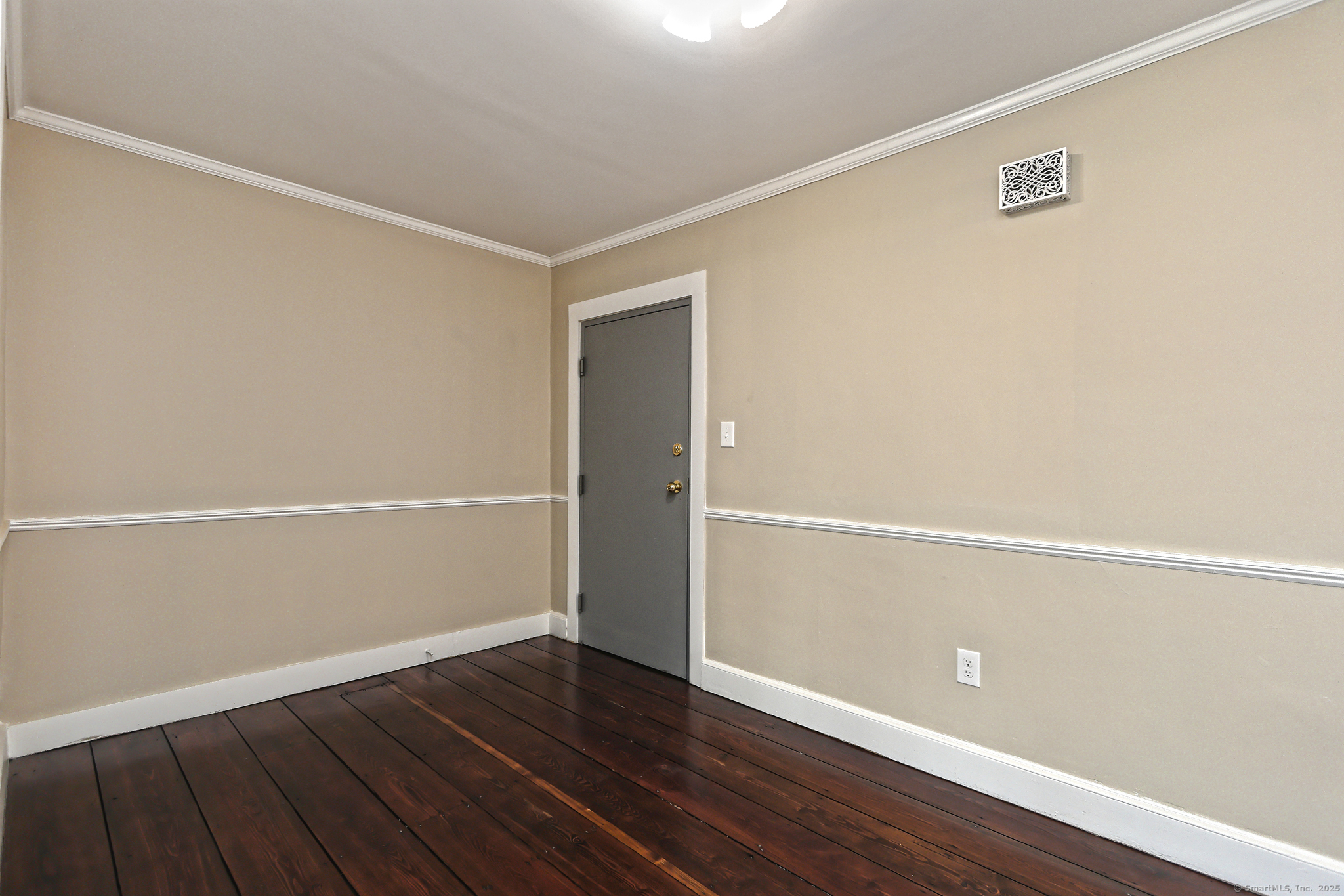 562 Amity Road, Unit D Bethany, CT 06524 - Photo 5 of 40 a view of an empty room with wooden floor