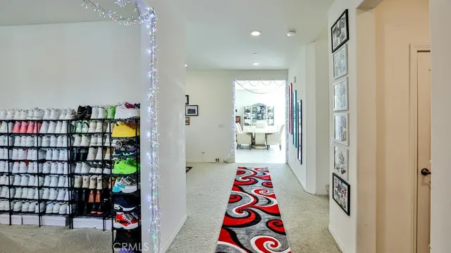 a living room with lots of furniture and toys
