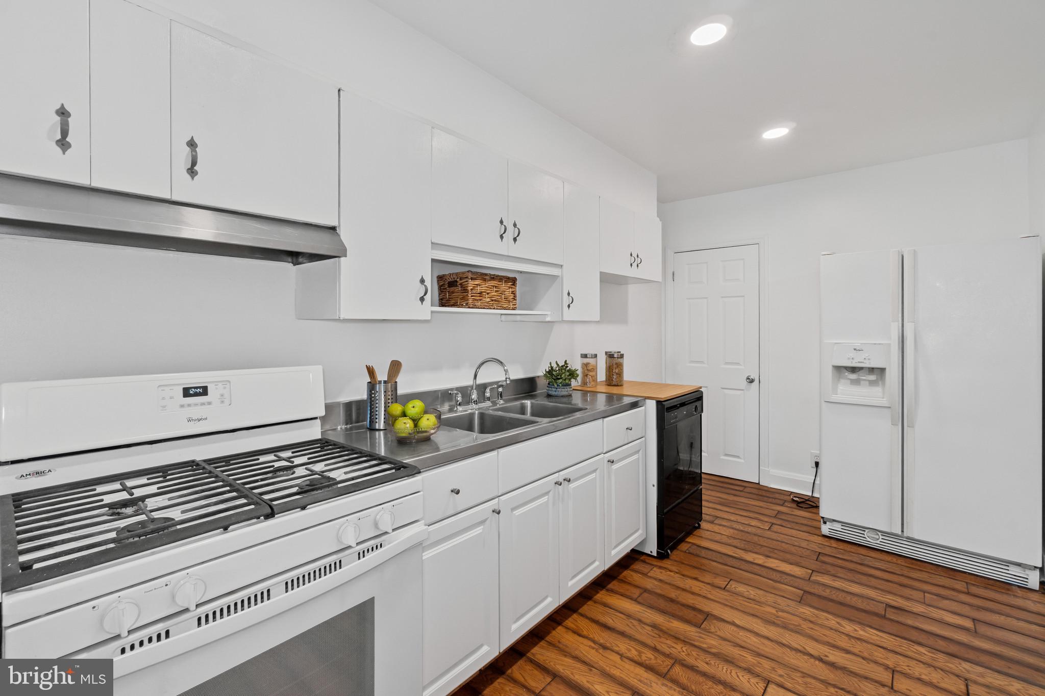 308 Greenlow Road Catonsville, MD 21228 - Photo 13 of 33 a kitchen with lot of cabinets and appliances