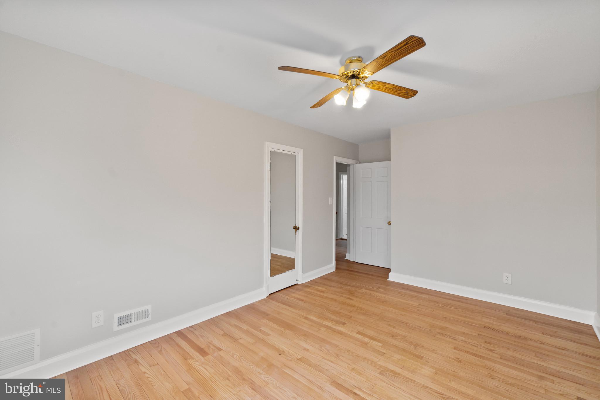 308 Greenlow Road Catonsville, MD 21228 - Photo 20 of 33 a view of a big room with wooden floor and cabinet