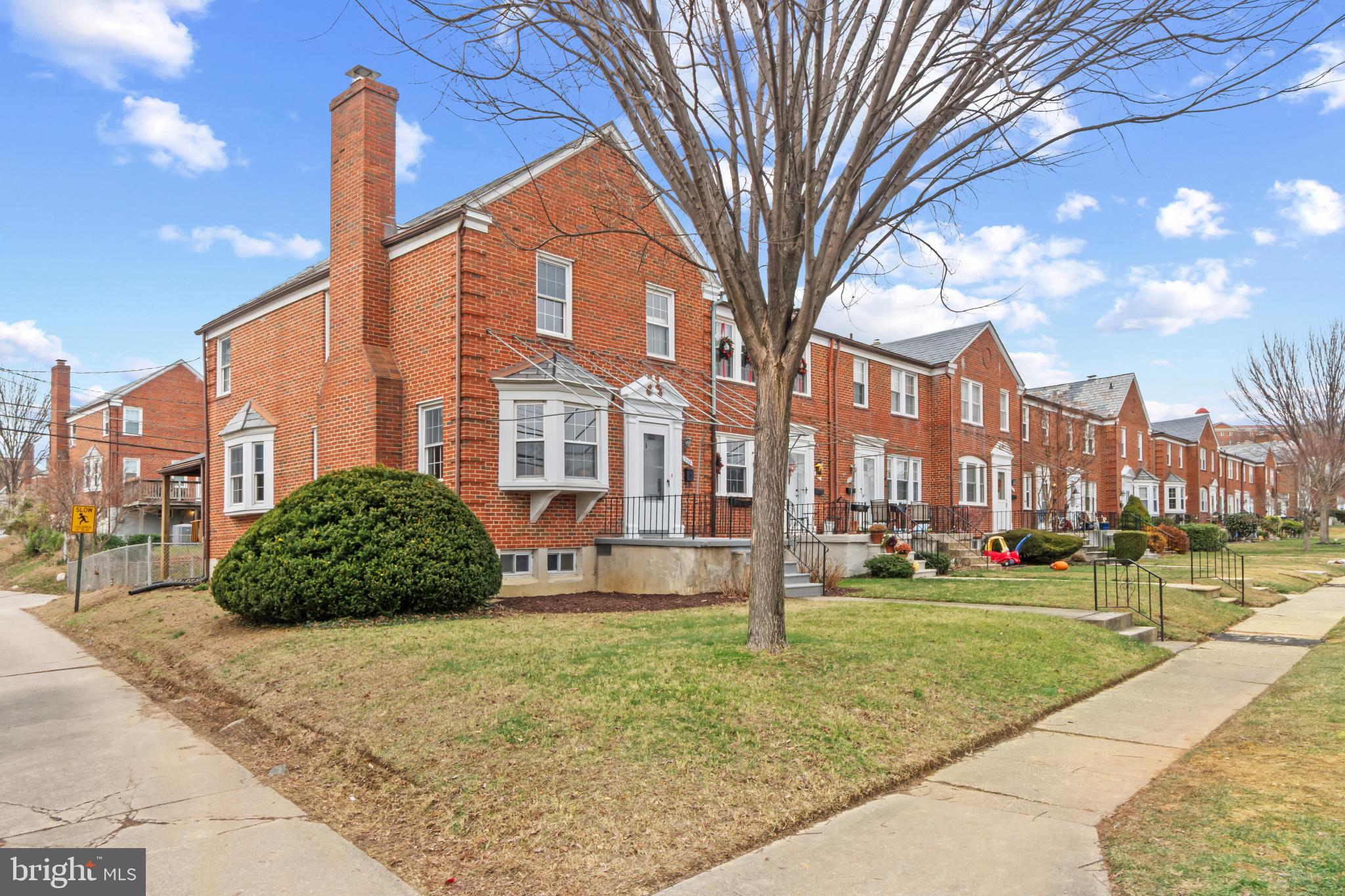 308 Greenlow Road Catonsville, MD 21228 - Photo 2 of 33 a front view of a building with a yard
