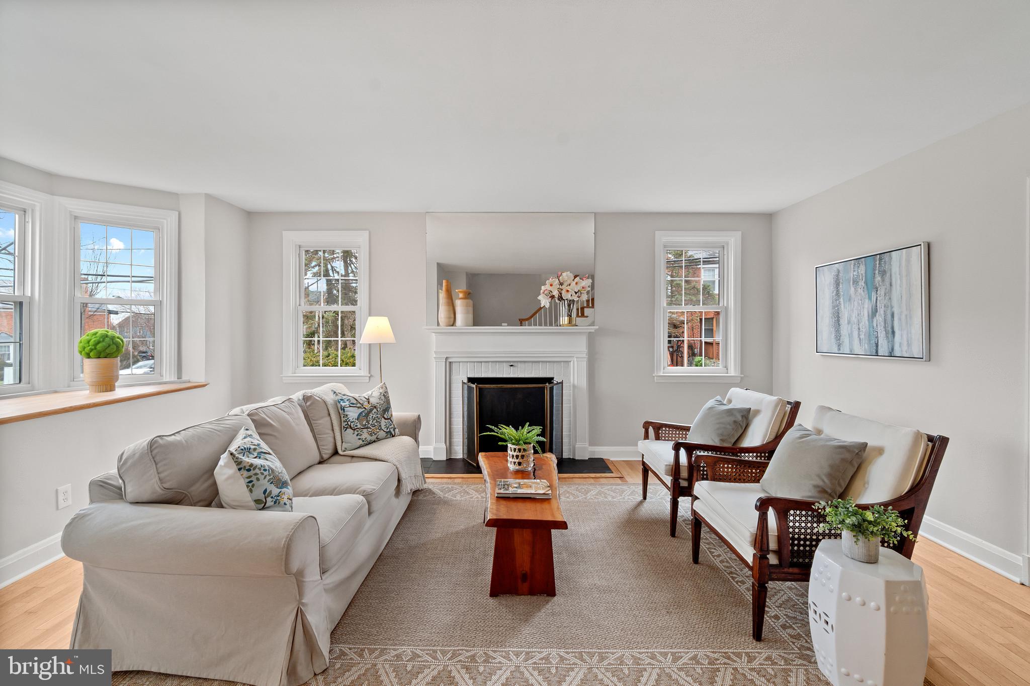 308 Greenlow Road Catonsville, MD 21228 - Photo 7 of 33 a living room with furniture and a fireplace
