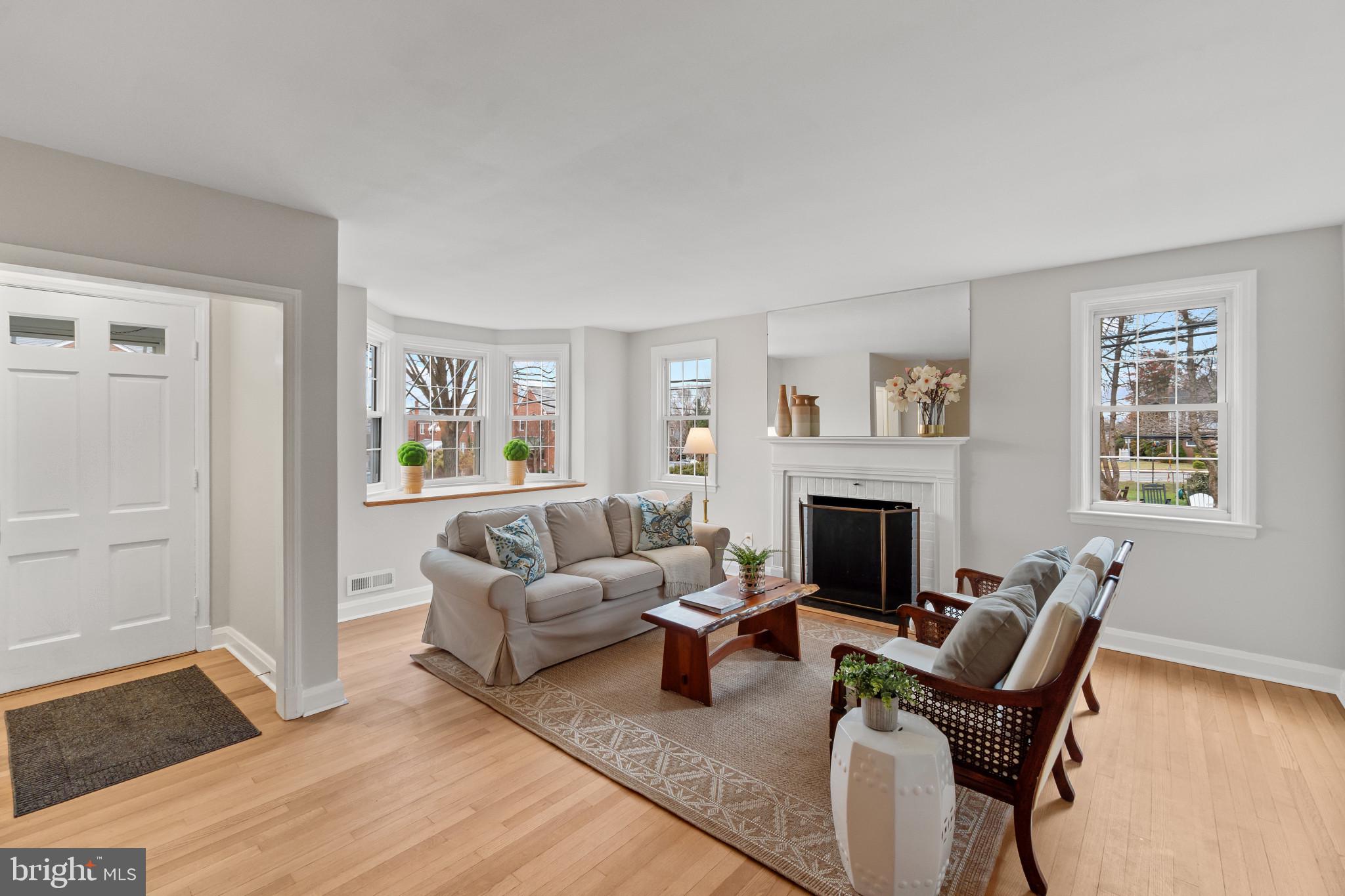 308 Greenlow Road Catonsville, MD 21228 - Photo 8 of 33 a living room with furniture and a fireplace
