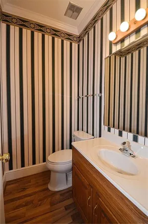 a bathroom with a sink and a toilet