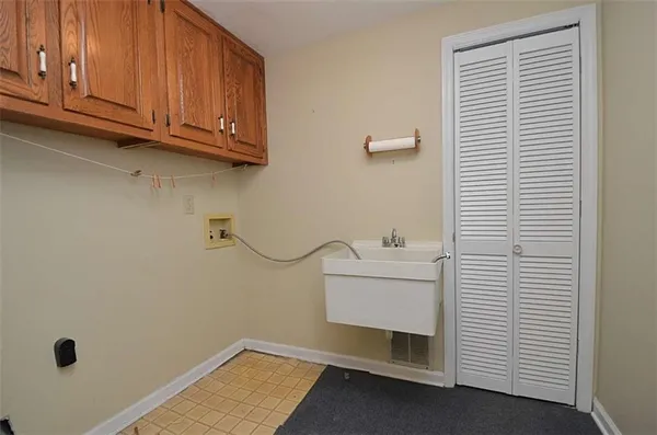 a view of storage and utility room with washer and dryer
