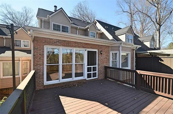 a view of a house with a large window