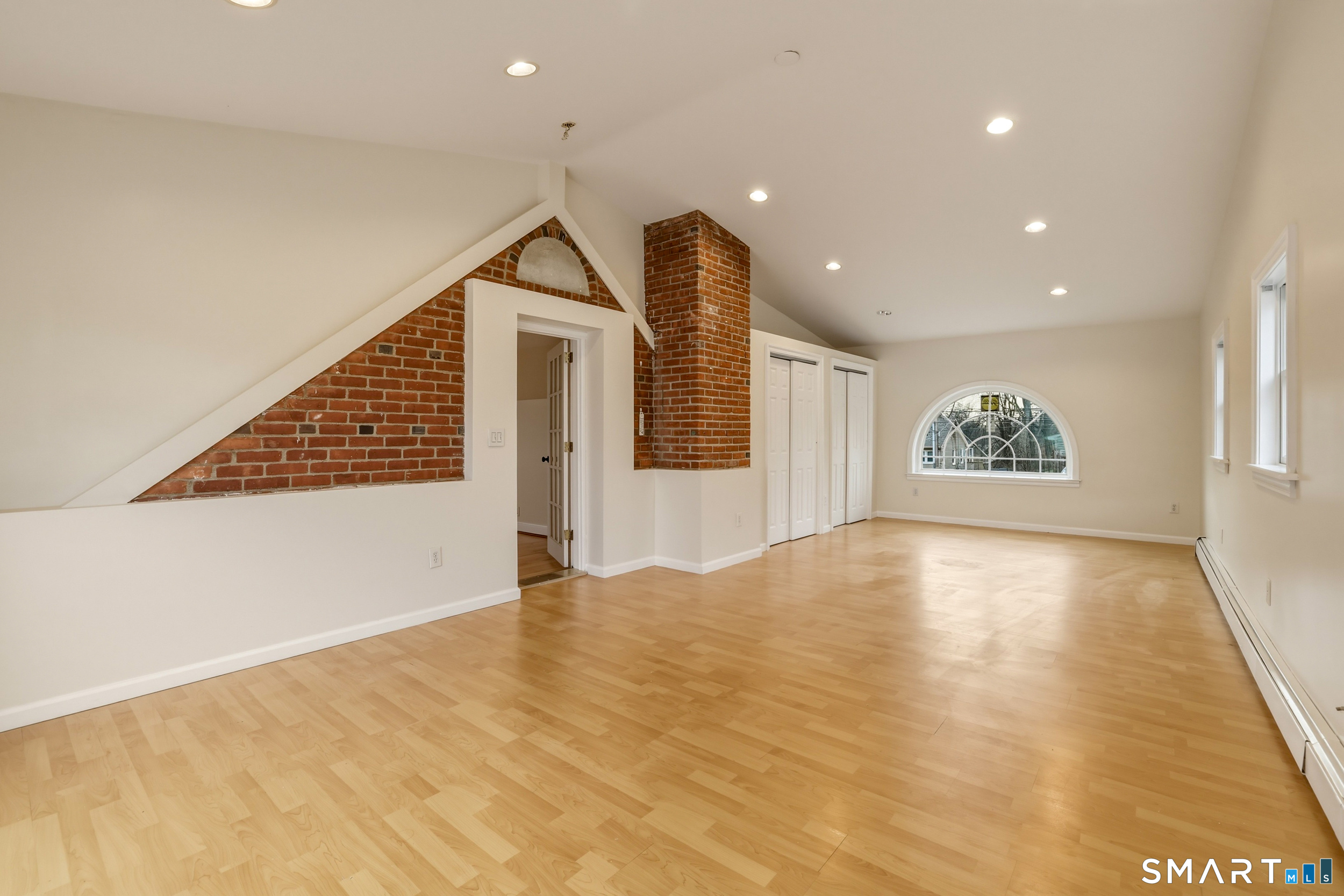 102 Lawler Road West Hartford, CT 06117 - Photo 19 of 42 a view of an empty room and a window