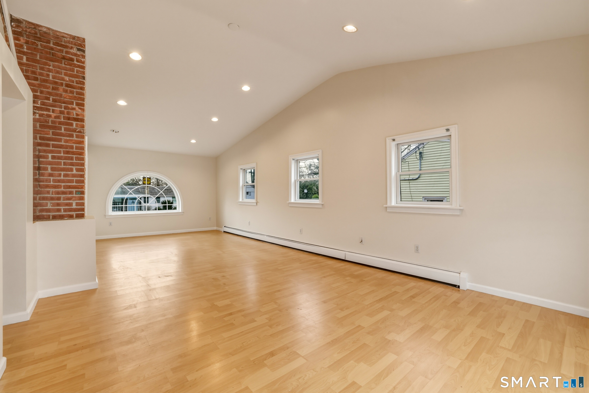 102 Lawler Road West Hartford, CT 06117 - Photo 21 of 42 an empty room with a empty space and windows