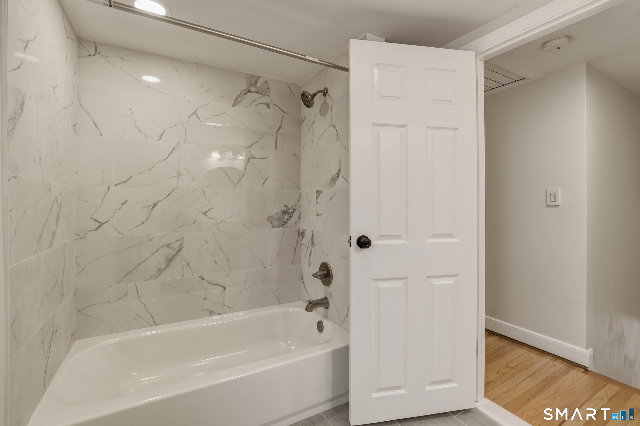 102 Lawler Road West Hartford, CT 06117 - Photo 27 of 42 a bathroom with a bathtub