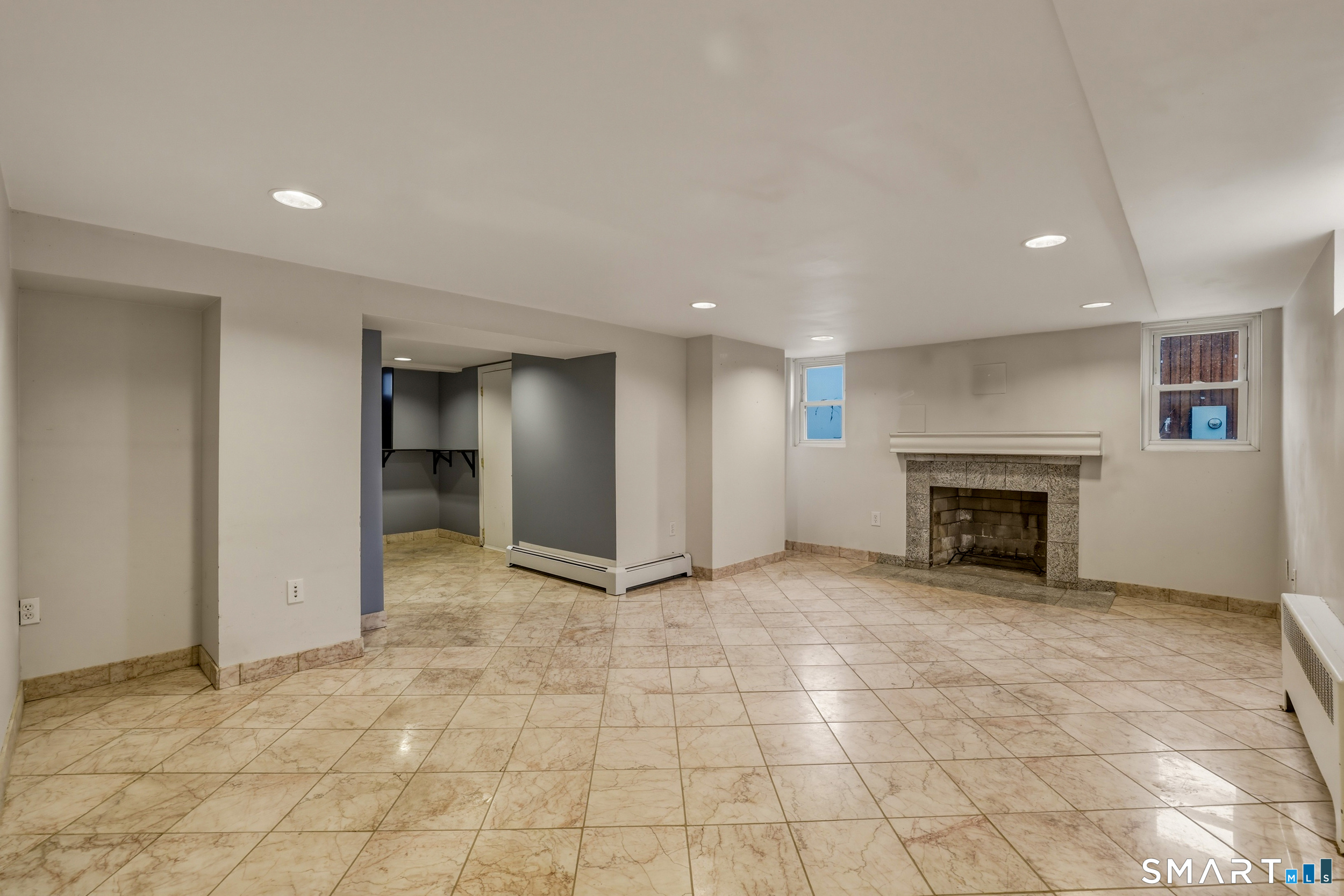 102 Lawler Road West Hartford, CT 06117 - Photo 29 of 42 a view of an empty room with a fireplace