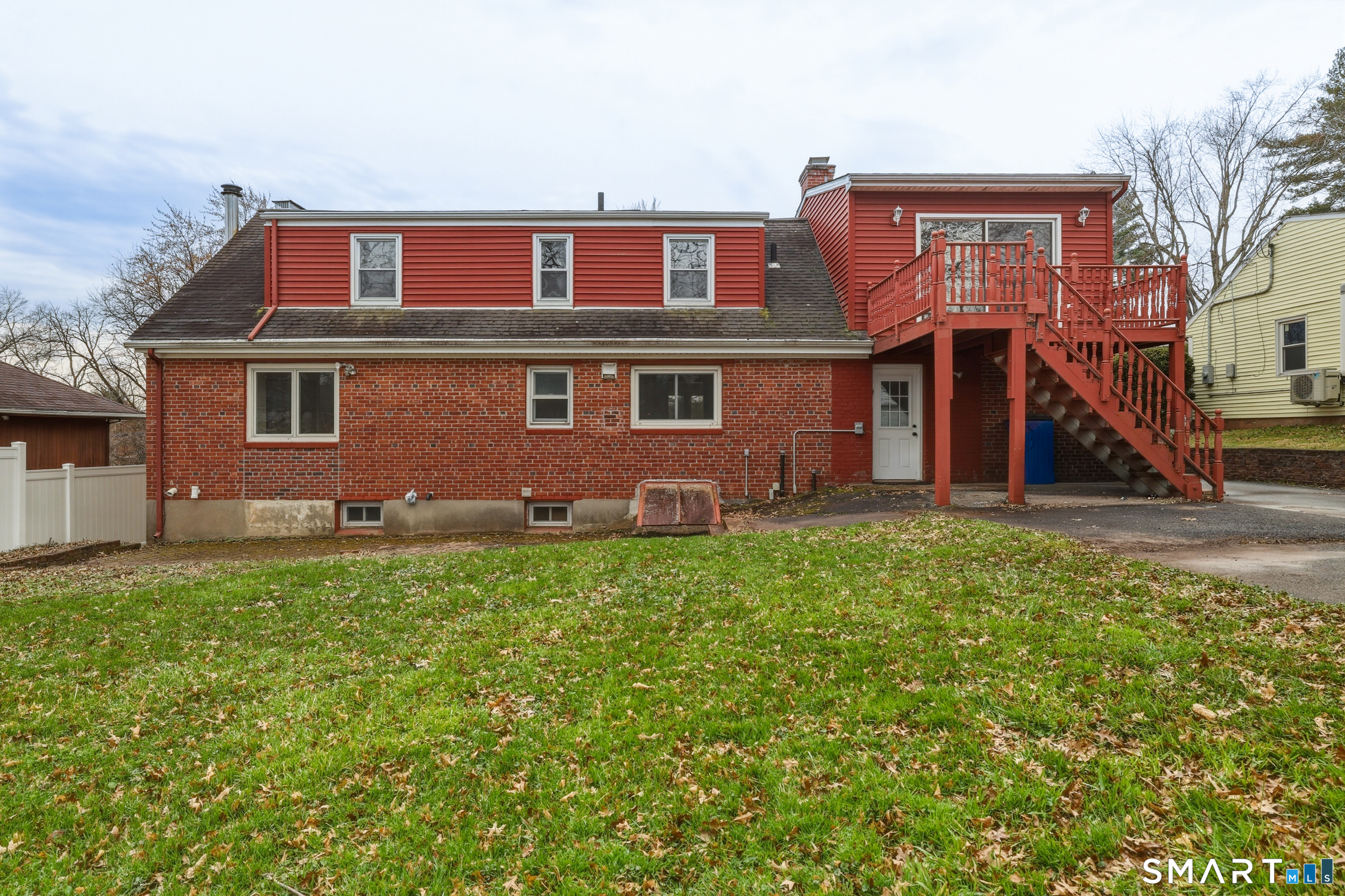 102 Lawler Road West Hartford, CT 06117 - Photo 39 of 42 a front view of a house with garden