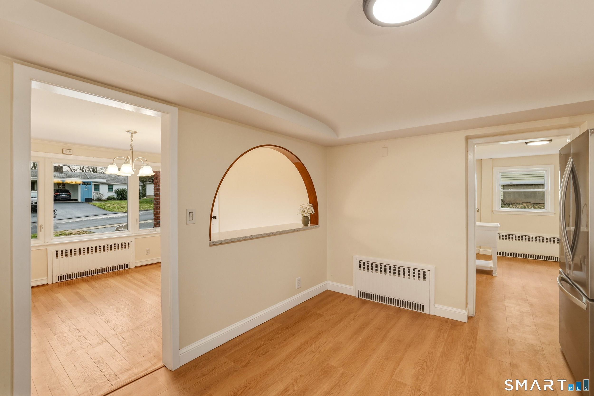 102 Lawler Road West Hartford, CT 06117 - Photo 4 of 42 a view of a livingroom with wooden floor and a rug