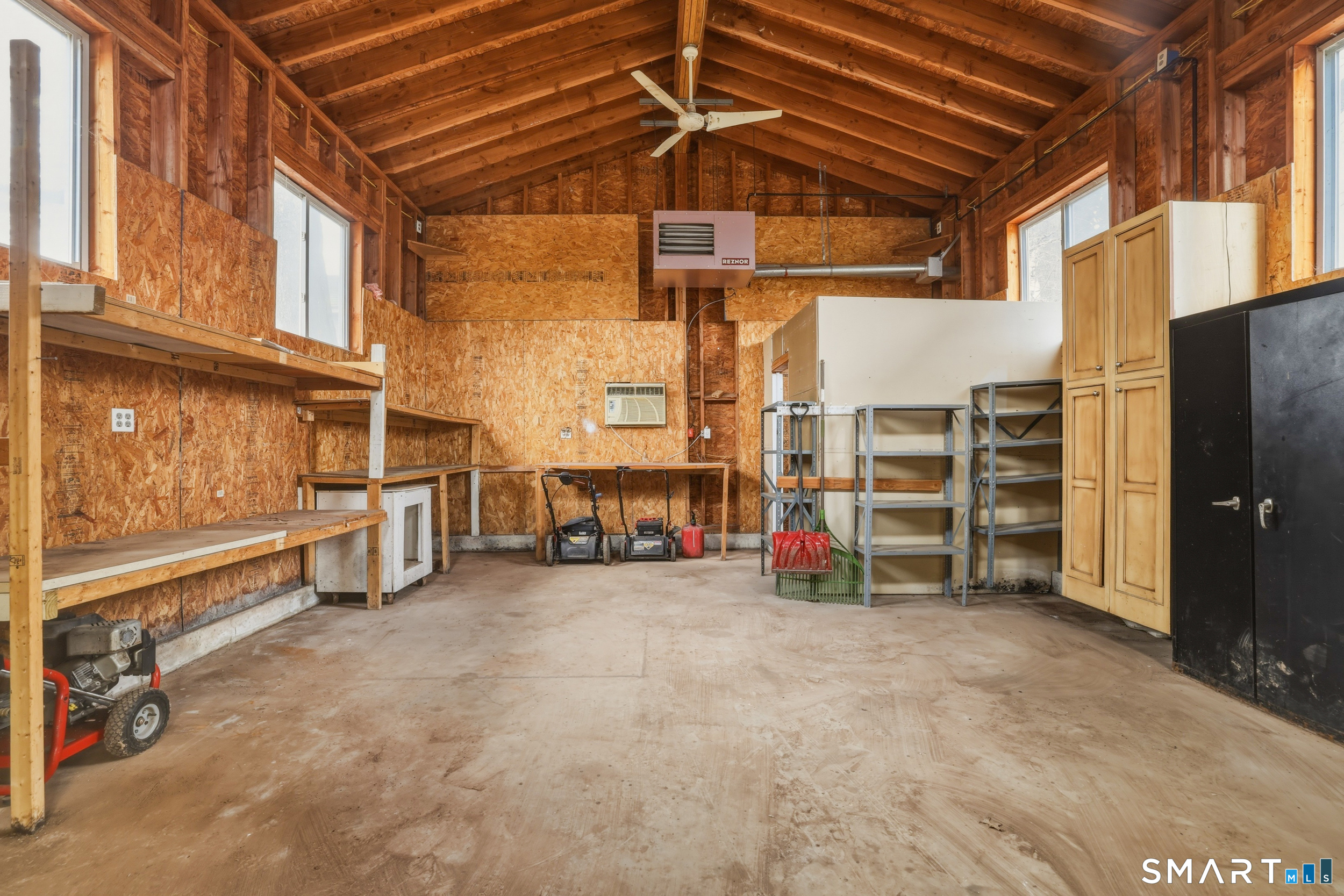 102 Lawler Road West Hartford, CT 06117 - Photo 41 of 42 a view of a big room with furniture and a large window
