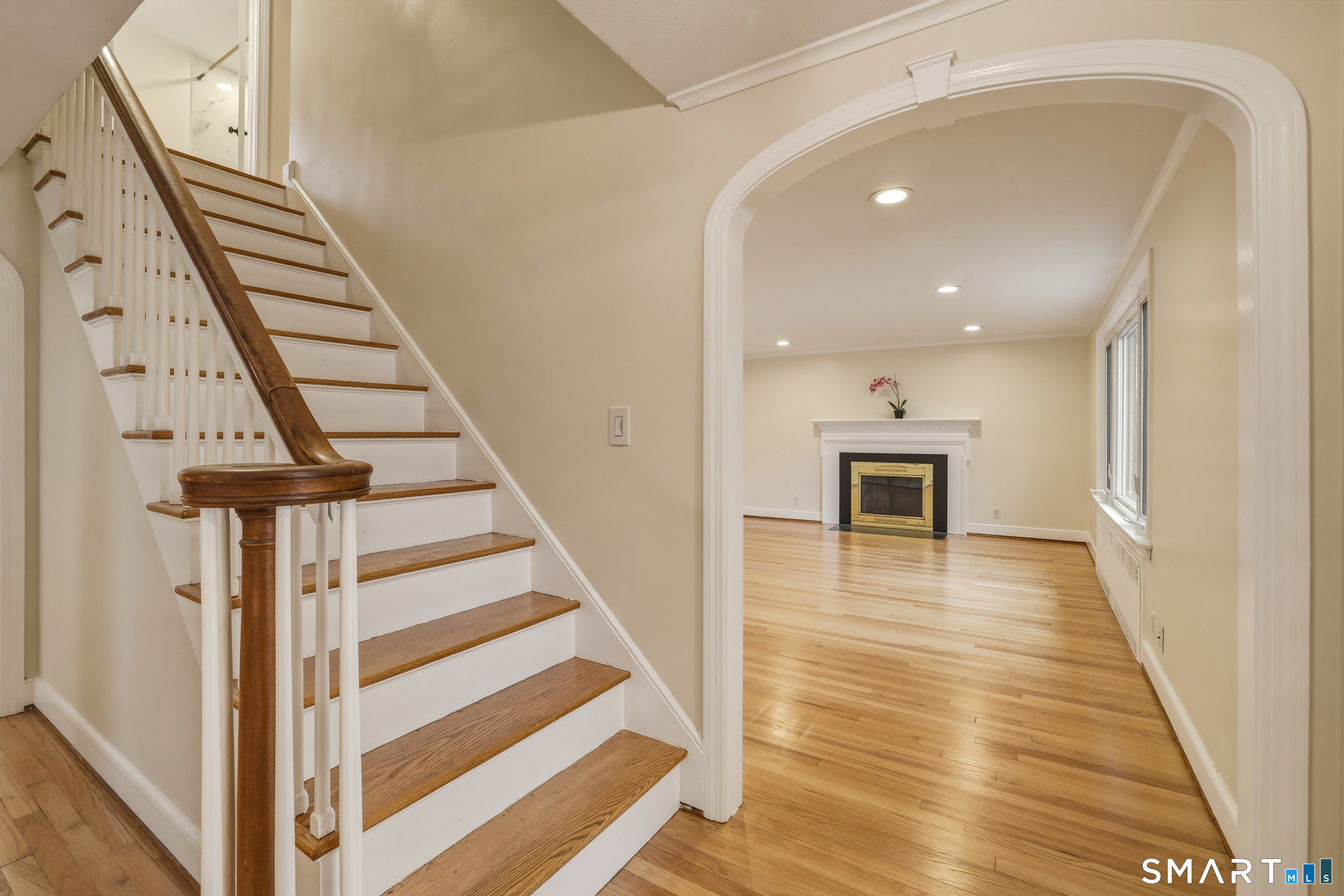 102 Lawler Road West Hartford, CT 06117 - Photo 5 of 42 a view of entryway and hall with wooden floor