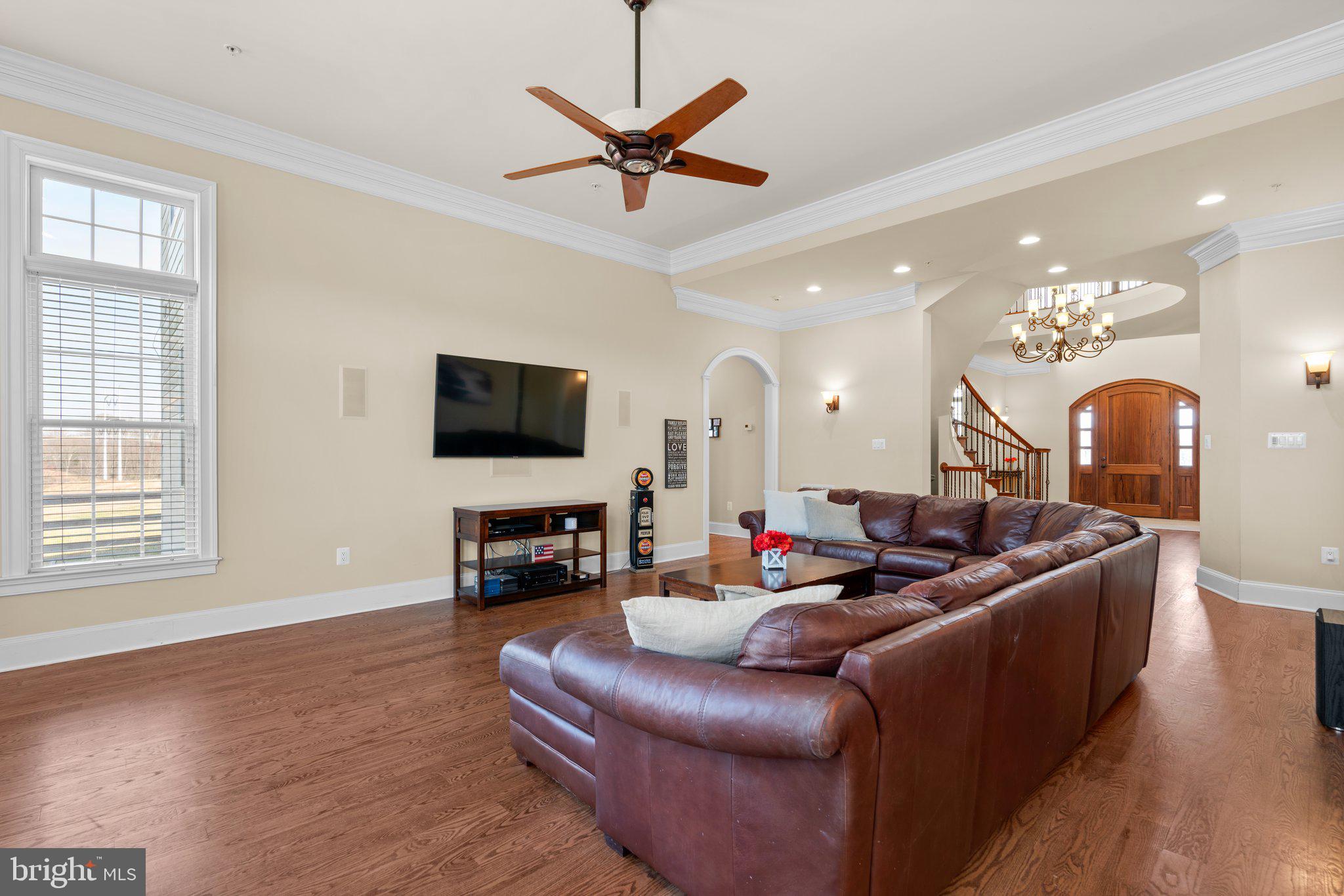 7251 Annapolis Rock Road Gaithersburg, MD 20882 - Photo 13 of 78 a living room with furniture a window and a flat screen tv