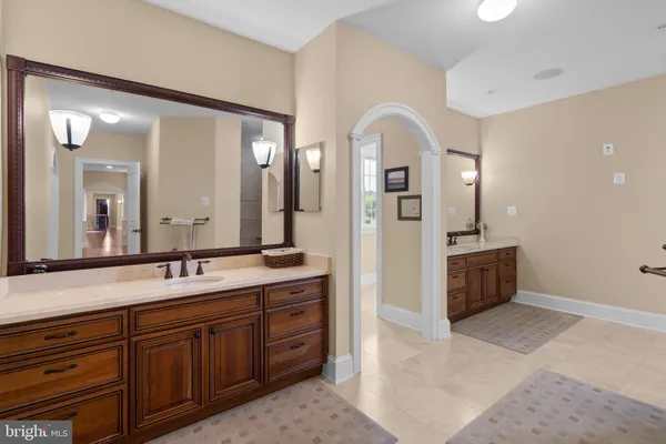 a view of a closet with storage and utility room