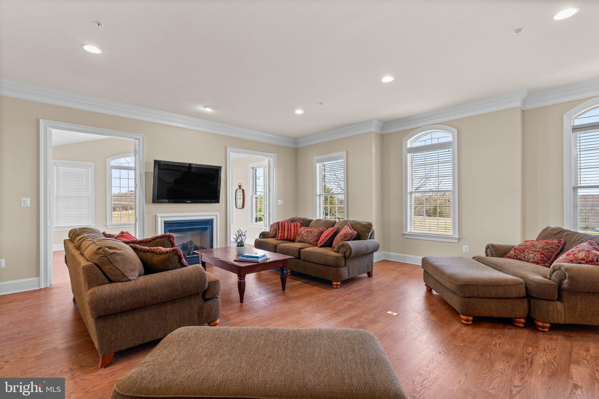 7251 Annapolis Rock Road Gaithersburg, MD 20882 - Photo 4 of 78 a living room with furniture and a flat screen tv