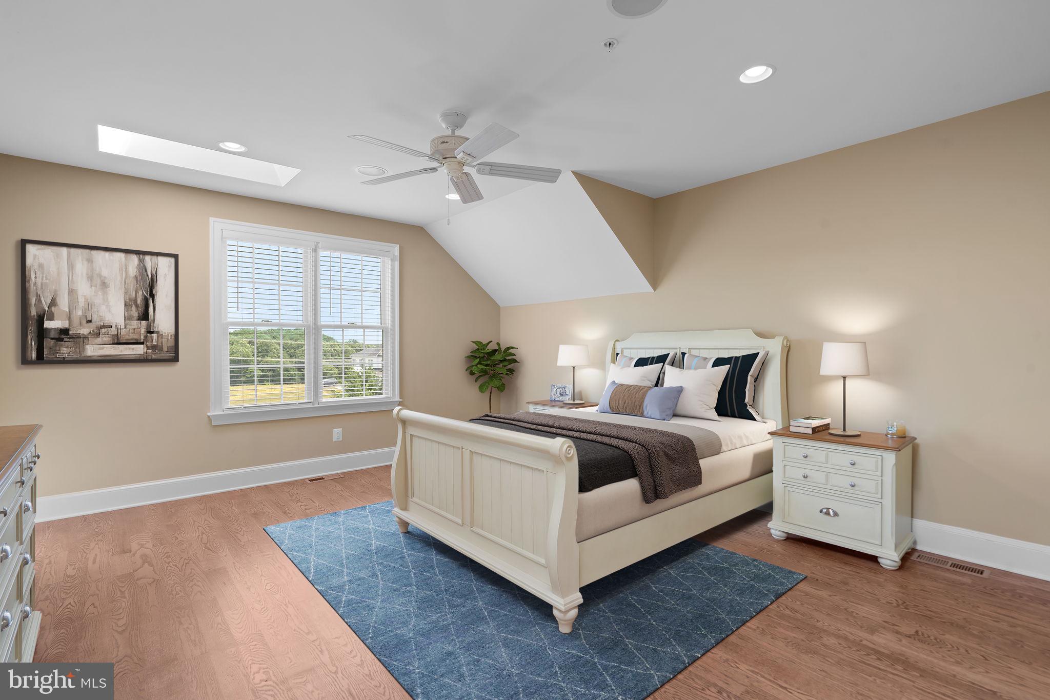 7251 Annapolis Rock Road Gaithersburg, MD 20882 - Photo 52 of 78 a spacious bedroom with a large bed and a window