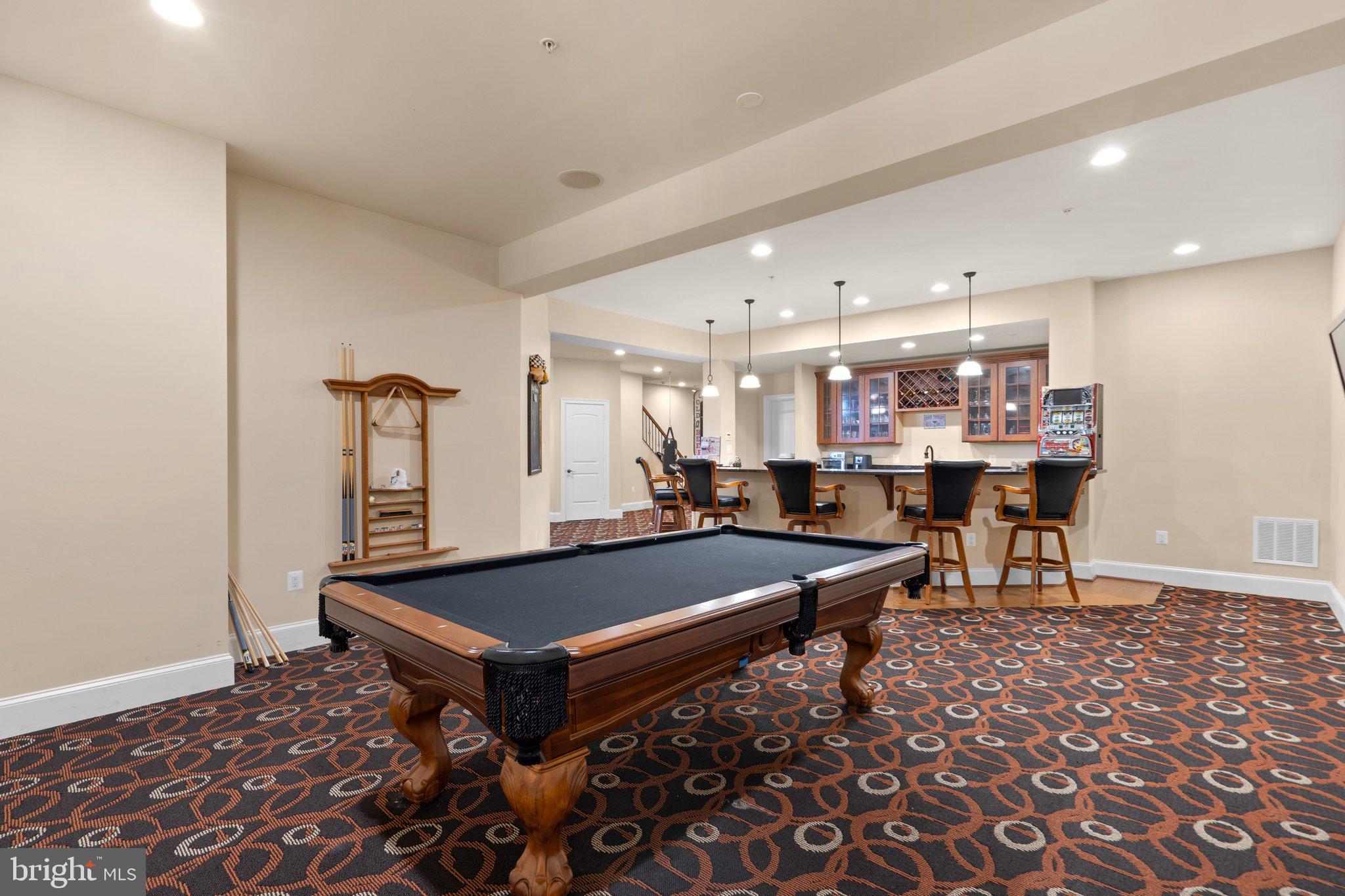 7251 Annapolis Rock Road Gaithersburg, MD 20882 - Photo 60 of 78 a room with gym equipment and a table