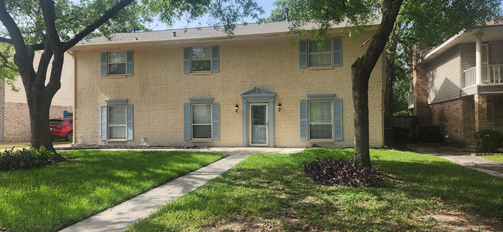 5006 Droddy Street Houston, TX 77091 - Photo 9 of 9 a front view of a house with garden