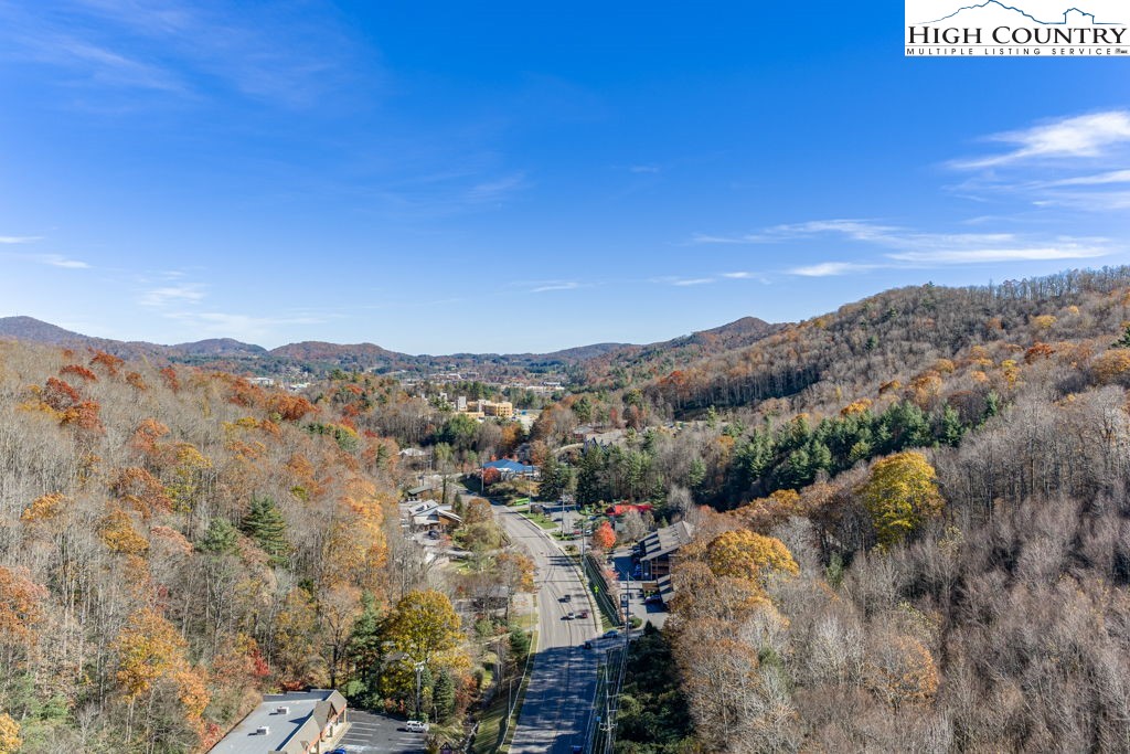 105 Highway Boone Nc 28607 Boone, NC 28607 - Photo 11 of 19 a view of a city with mountains in the background