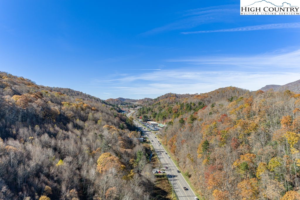 105 Highway Boone Nc 28607 Boone, NC 28607 - Photo 12 of 19 a view of a city with mountains in the background