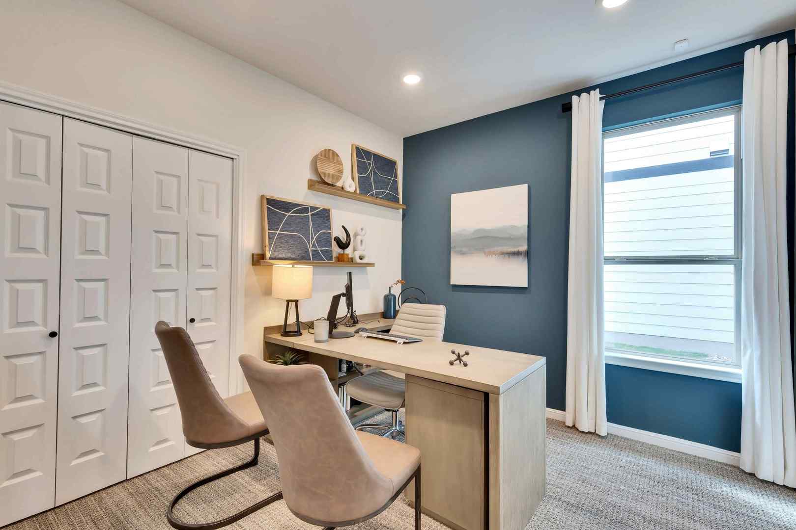 1205 Lavender Way Georgetown, TX 78628 - Photo 8 of 14 A well-lit office space features plush carpeting and a large window, offering comfort and natural illumination.