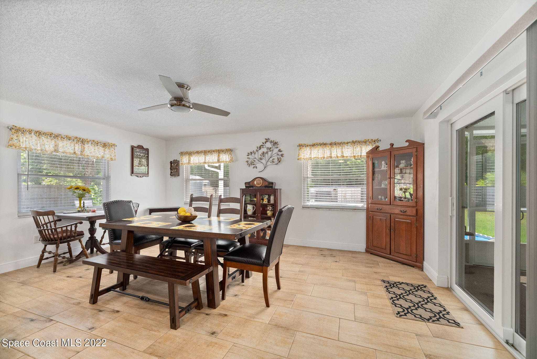 1821 Britt Road Cocoa, FL 32926 - Photo 23 of 63 a view of a dining room with furniture window and outside view