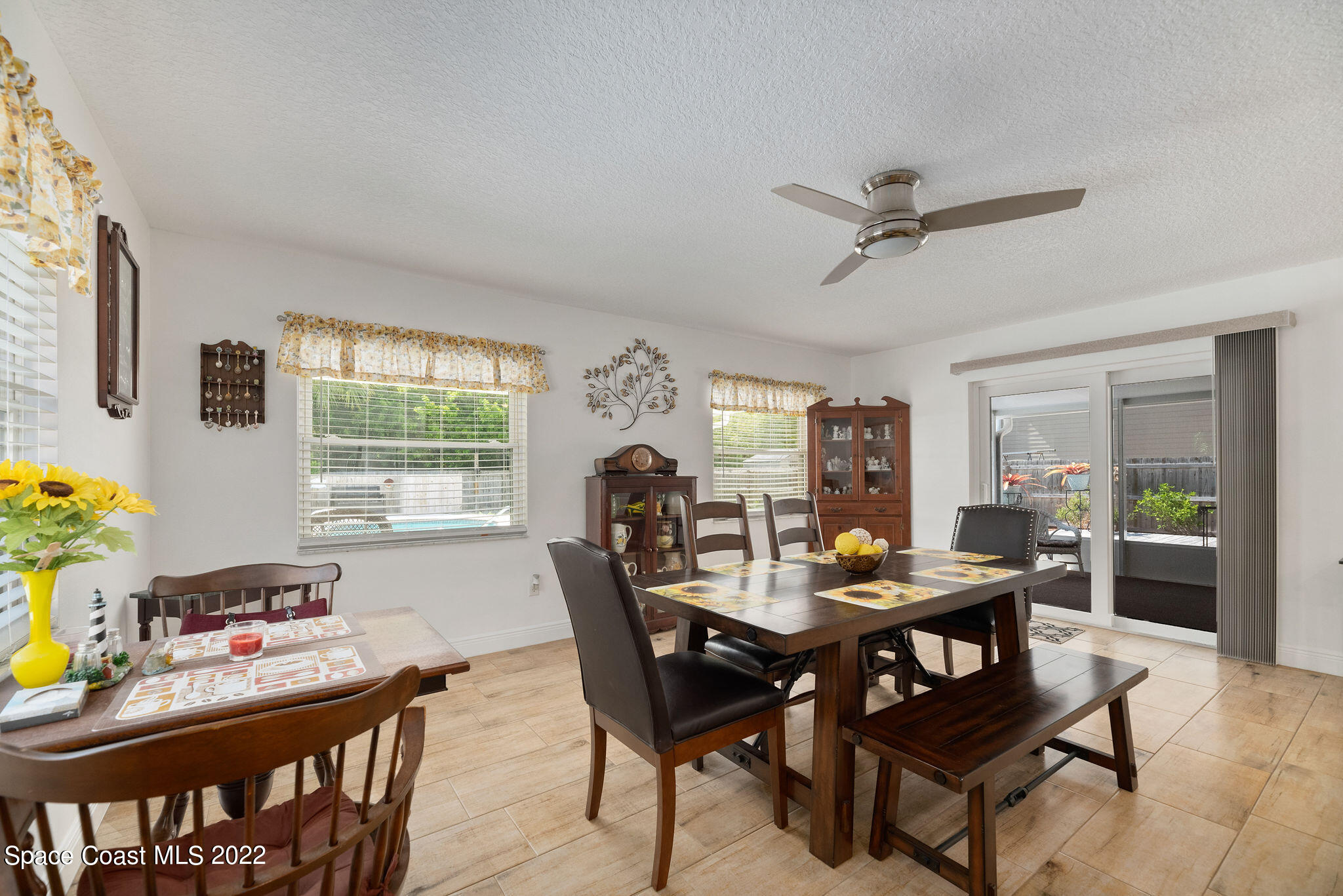 1821 Britt Road Cocoa, FL 32926 - Photo 24 of 63 a dining room with furniture and window