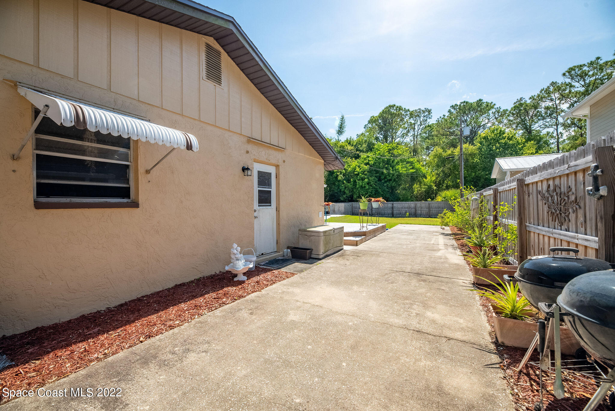 1821 Britt Road Cocoa, FL 32926 - Photo 35 of 63 a view of outdoor space and barbecue grill